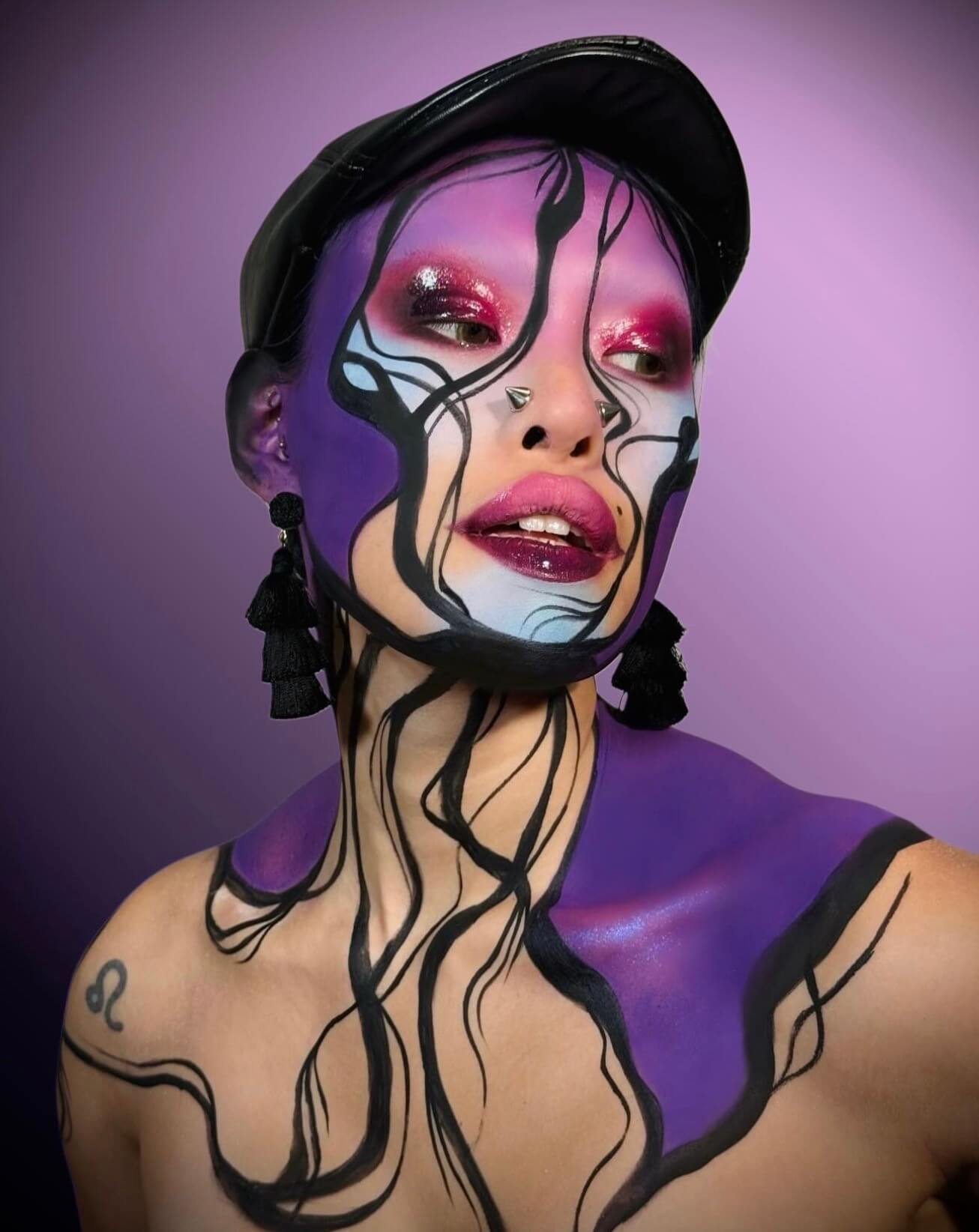 Purple graphic body paint portrait
